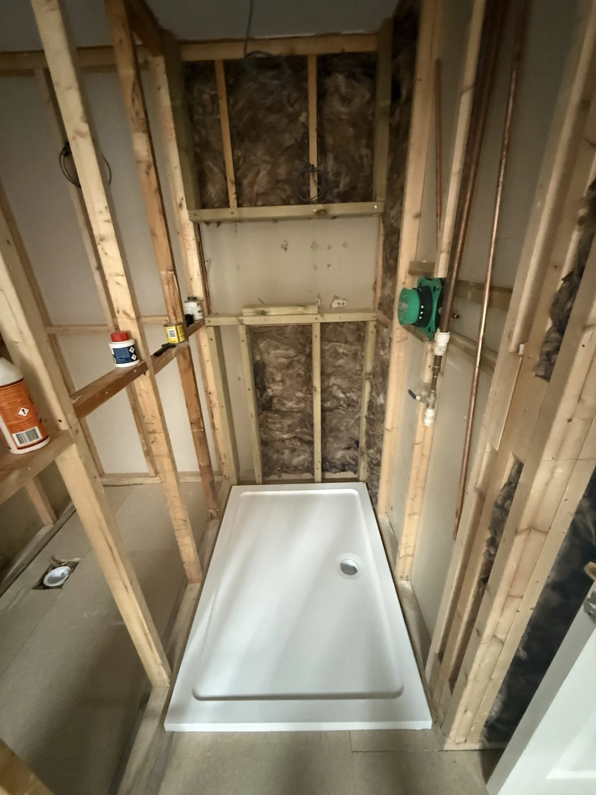 Shower tray and concealed valve fitted inside new stud walls in Bath