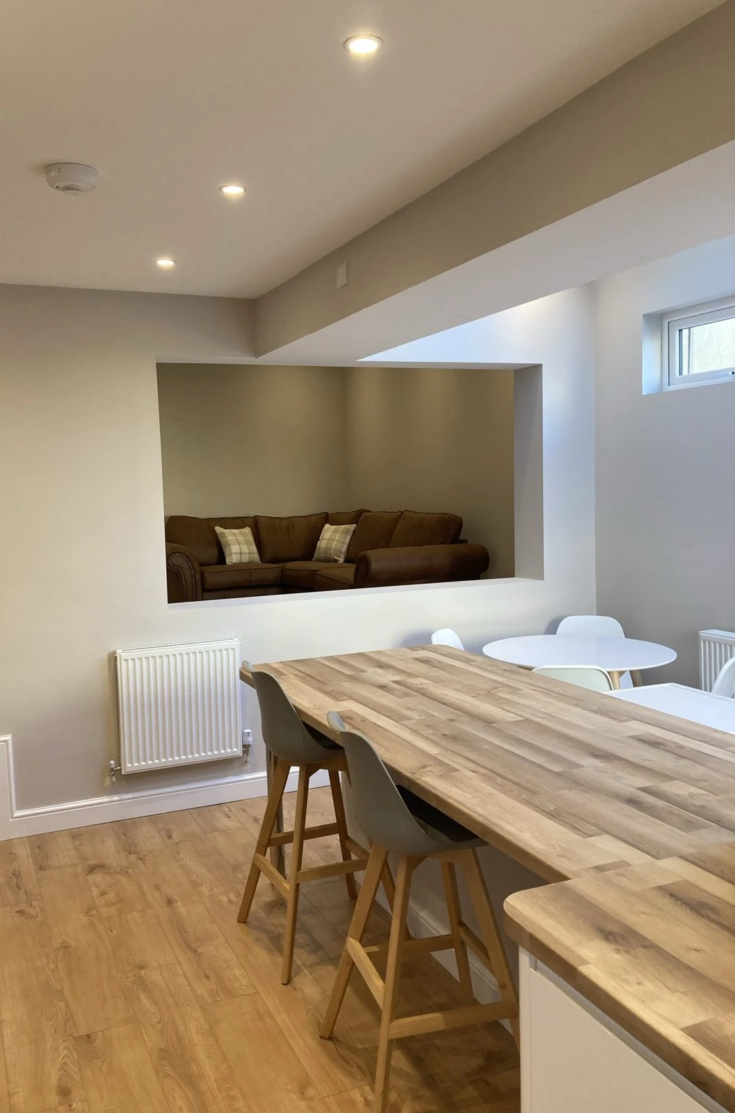 Breakfast bar with a serving hatch through to the living room
