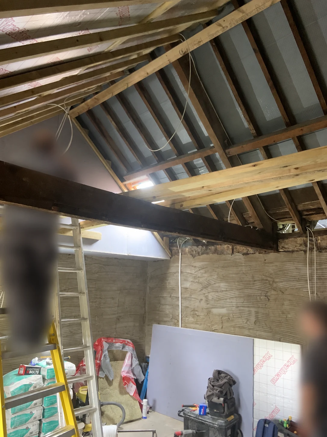 Loft during renovation with new insulation and timber framing